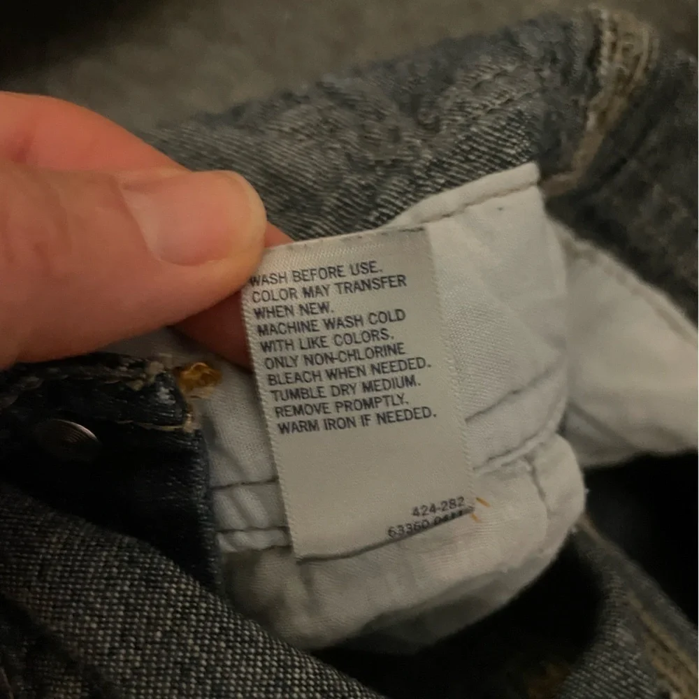 Osh Kosh Denim overalls with patches and spell out